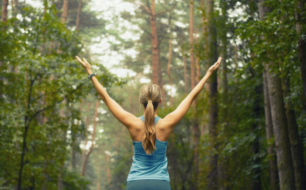 healthy lifestyle fitness sporty woman early in forest area